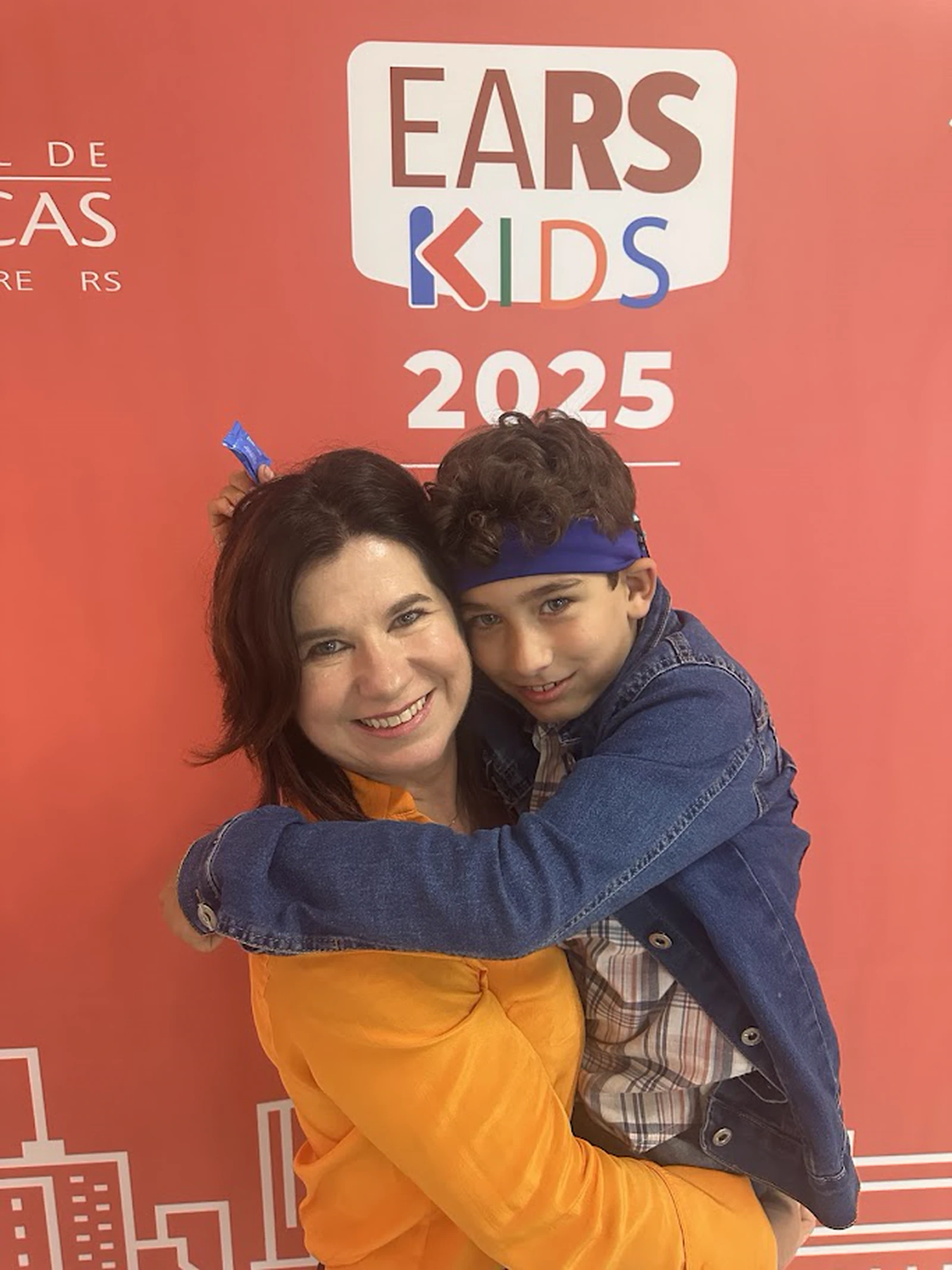 Dra. Letícia Rosito e seu filho João no EARS Kids